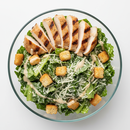 Classic Caesar Salad with grilled chicken, romaine, and parmesan
